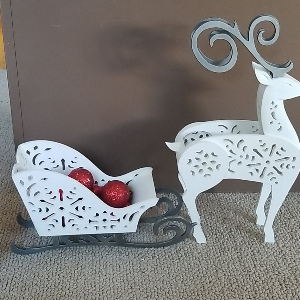 Reindeer and sleigh holiday decorations